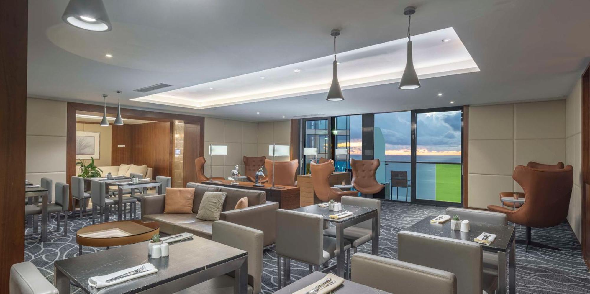 Hotel Hilton Batumi Esterno foto The Club Lounge at the airport