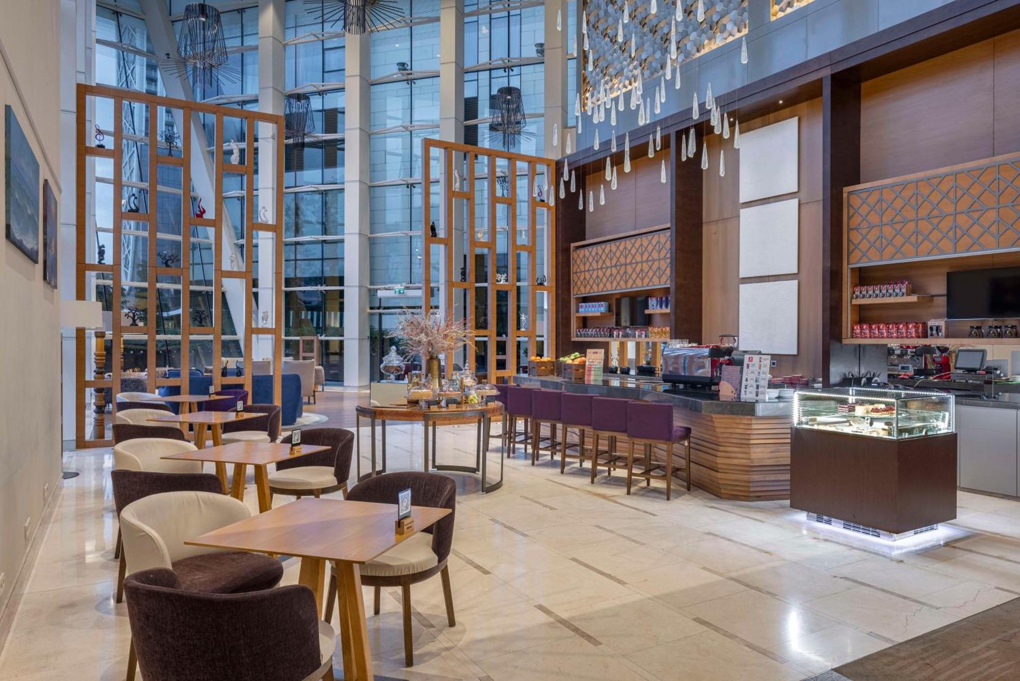 Hotel Hilton Batumi Esterno foto The Lounge at the airport
